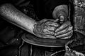 Hands of a potter forming clay