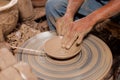 Hands of potter, was produced on range of pot. Royalty Free Stock Photo