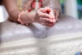 Hands pouring blessing water into bride`s bands, Thai wedding. Royalty Free Stock Photo