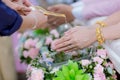 Hands pouring blessing water into bride`s bands, Thai wedding Royalty Free Stock Photo