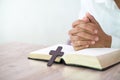 Hands praying on a Holy Bible, spirtuality and religion, Religious concepts Royalty Free Stock Photo