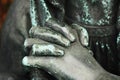 Hands of a praying statue close up Royalty Free Stock Photo