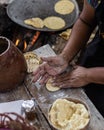 Hands preparing homemade pancakes, village cuisine
