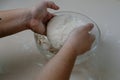 Hands preparing a loaf of homemade no knead bread dough Royalty Free Stock Photo