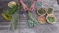 hands preparing to dry medical and spices herbs