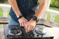 Hands of a professional DJ on the controller mix music Royalty Free Stock Photo