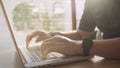 Hands of programmer typing on a laptop keyboard. computer language coding concept