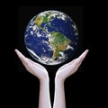 Hands protect earth ,Elements of this image furnished by NASA Royalty Free Stock Photo