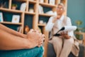 Hands, psychology and patient with anxiety in a session for help or mental health counseling. Healthcare, psychiatry and