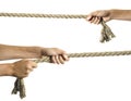 Hands pull a rope Royalty Free Stock Photo