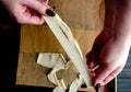 Hands Pulling Dough to Make Belt Noodles Royalty Free Stock Photo