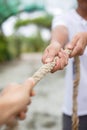 Hands pulling rope Royalty Free Stock Photo