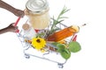 Hands pushing supermarket trolleys filled with pills