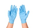 Hands putting on protective blue gloves. Royalty Free Stock Photo