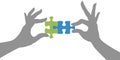 Hands puzzle pieces together solution Royalty Free Stock Photo