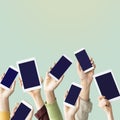 Hands raised holding mobile devices Royalty Free Stock Photo