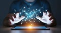 Hands interacting with glowing digital network above tablet screen technology connection Royalty Free Stock Photo