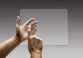 Hands reaching images on a futuristic tablet Royalty Free Stock Photo