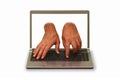 hands reaching out of laptop display and typing Royalty Free Stock Photo