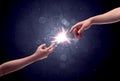 Hands reaching to light a spark Royalty Free Stock Photo