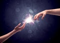 Hands reaching to light a spark Royalty Free Stock Photo