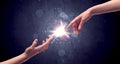 Hands reaching to light a spark Royalty Free Stock Photo