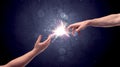 Hands reaching to light a spark Royalty Free Stock Photo