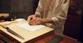 Hands, recipe and chef cooking sushi in restaurant for traditional Japanese cuisine or dish closeup. Kitchen, table for Royalty Free Stock Photo