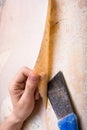 Hands removing old wallpaper Royalty Free Stock Photo