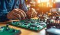 Hands repairing a circuit board in a clean tech workshop with precision tools and soft light. Royalty Free Stock Photo