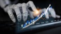 Hands of a robotic artificial intelligence agent interacting with a keyboard, generating financial data and analytics Royalty Free Stock Photo