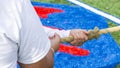 Hands on a rope during tug of war game Royalty Free Stock Photo