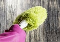 Hands in rubber gloves using duster to cleaning table Royalty Free Stock Photo