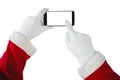 Hands of Santa Claus using mobile phone Royalty Free Stock Photo