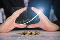 Hands saving money coins stack with growing business graph. Saving money concept Royalty Free Stock Photo