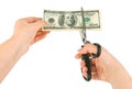 Hands with scissors cutting money Royalty Free Stock Photo