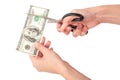 Hands with scissors cutting money Royalty Free Stock Photo