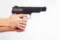 Hands with semi-automatic handgun on white background Royalty Free Stock Photo