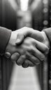 Hands Shaking in Server Room Symbolizing Partnership and Collaboration Royalty Free Stock Photo