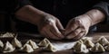 Hands shape a doughy mixture into perfect dumplings, following a precise folding technique, concept of Traditional