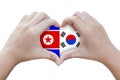 Hands in the shape of heart with symbols of the flag of north an