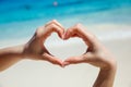 Hands in shape of the heart. Tropical beach. Love concept Royalty Free Stock Photo