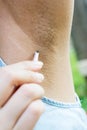 Hands are shaved, armpits or plucking the armpits with tweezers Royalty Free Stock Photo