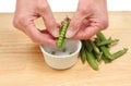 Hands shelling peas Royalty Free Stock Photo