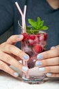 Hands with short manicured nails colored with gray nail polish Royalty Free Stock Photo