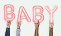 Hands showing baby balloons word Royalty Free Stock Photo