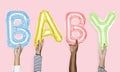 Hands showing baby balloons word Royalty Free Stock Photo