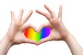 Hands showing heart sign with LGBT rainbow background inside it. Sexual minority, homosexuality and equal rights concept Royalty Free Stock Photo