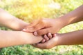 Hands showing thumbs sign together with sun light on sky  background Royalty Free Stock Photo