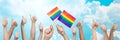 Hands showing thumbs up and holding rainbow flags Royalty Free Stock Photo